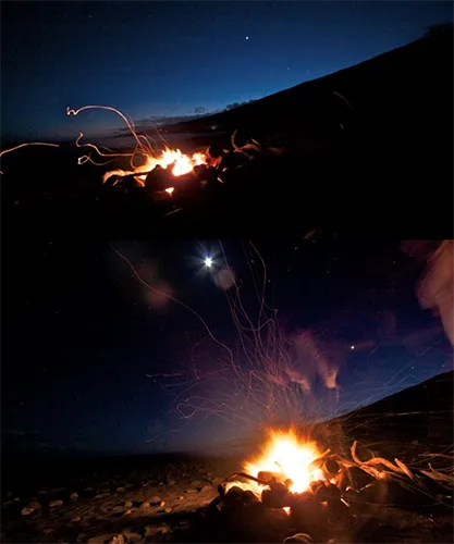 campfire on a beach at a sunset - Otis Nebula issue archive image