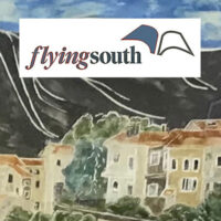 painting of buildings and mountains with flying south and book pages flying