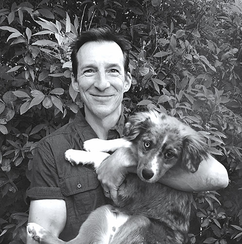 Author Todd Mitchell and his dog photo