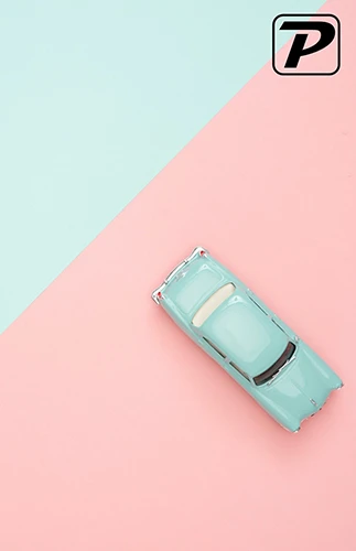 A cover of Palooka in salmon and mint with a mint-colored toy car