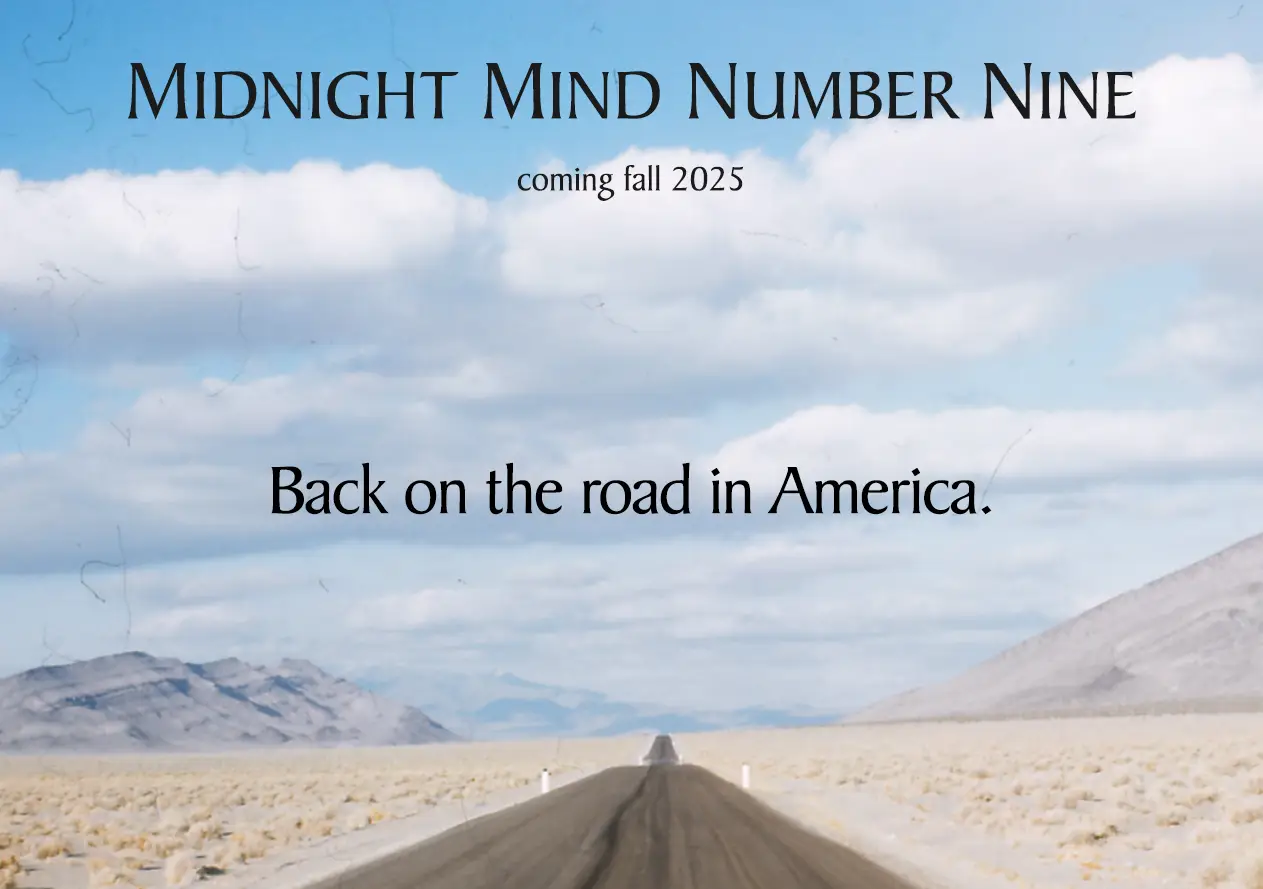 Advertisement for Midnight Mind Magazine Issue 9, featuring a desert road with mountains in the background and text announcing the issue's release in fall 2025.